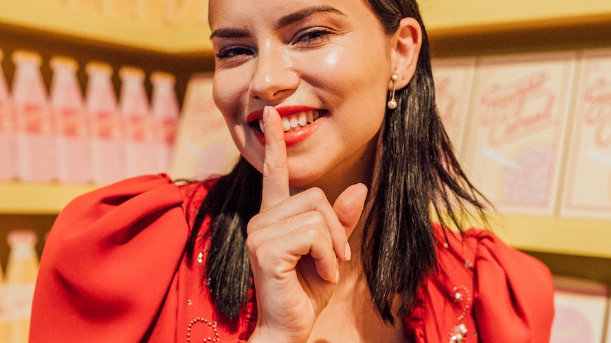 Adriana Lima on Red Lipstick, Meditation, and the Brazilian Beauty Secret to Shiny Hair